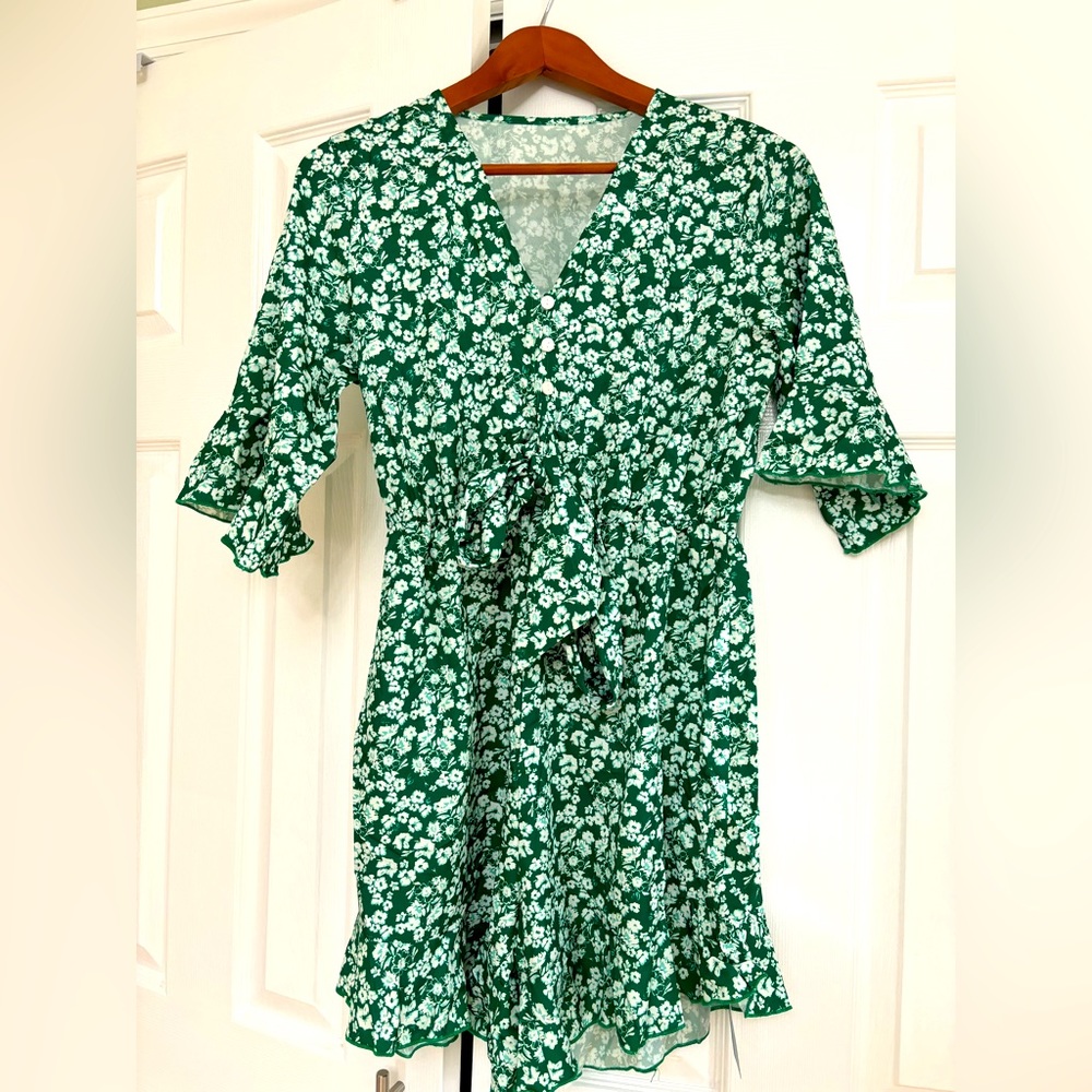 Brand new, floral drawstring green romper